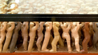 Illustration for article titled 180,000 Tiny People Are Holding Up This Floor